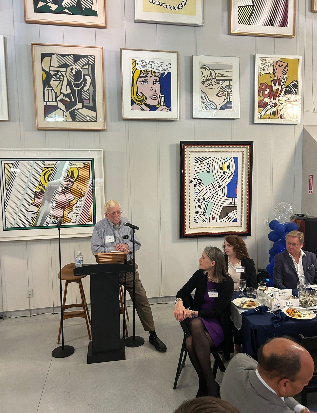 Robert J. Abernethy speaking at podium
